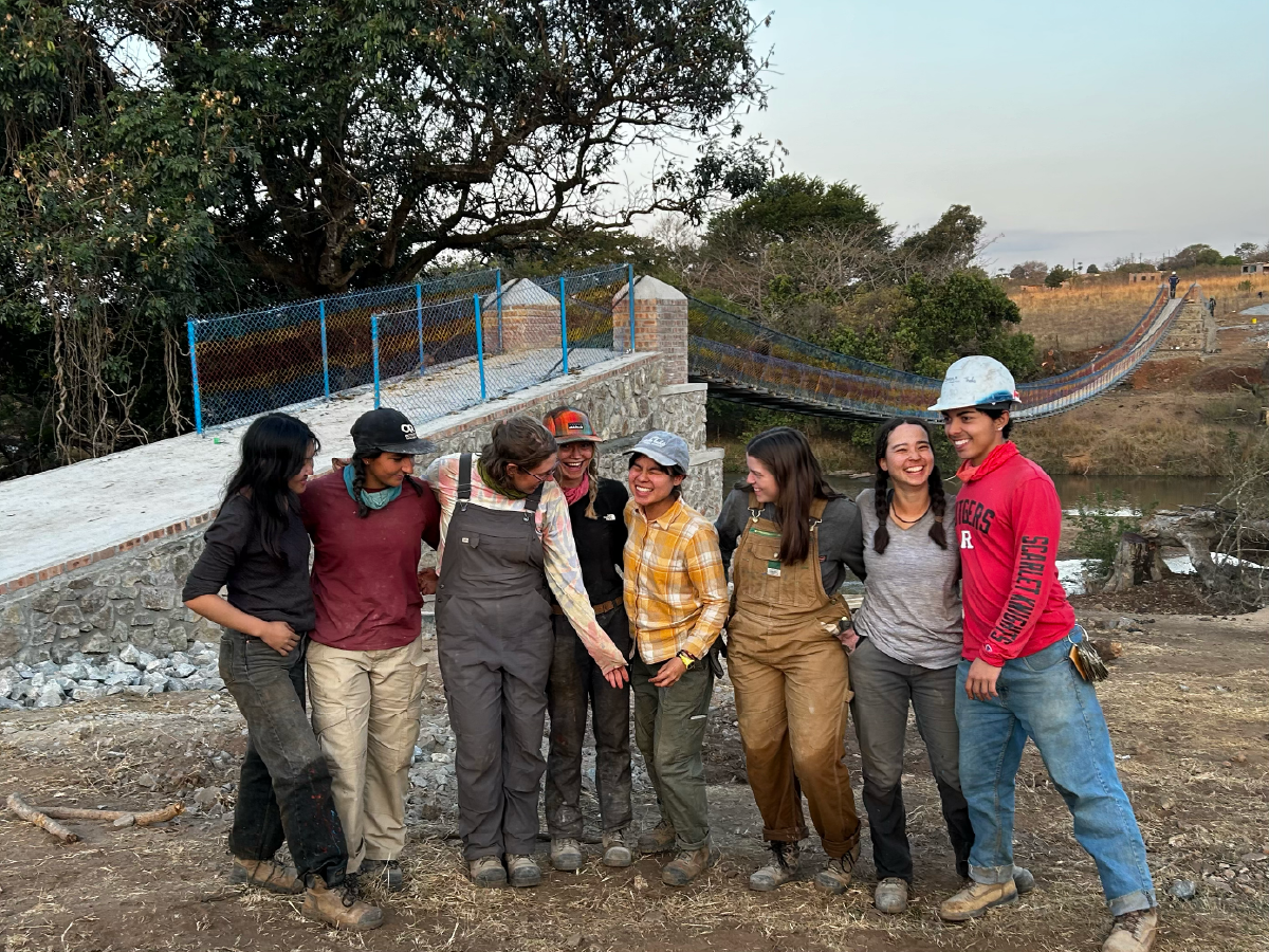 EIA Team standing next to their 2024 bridge project